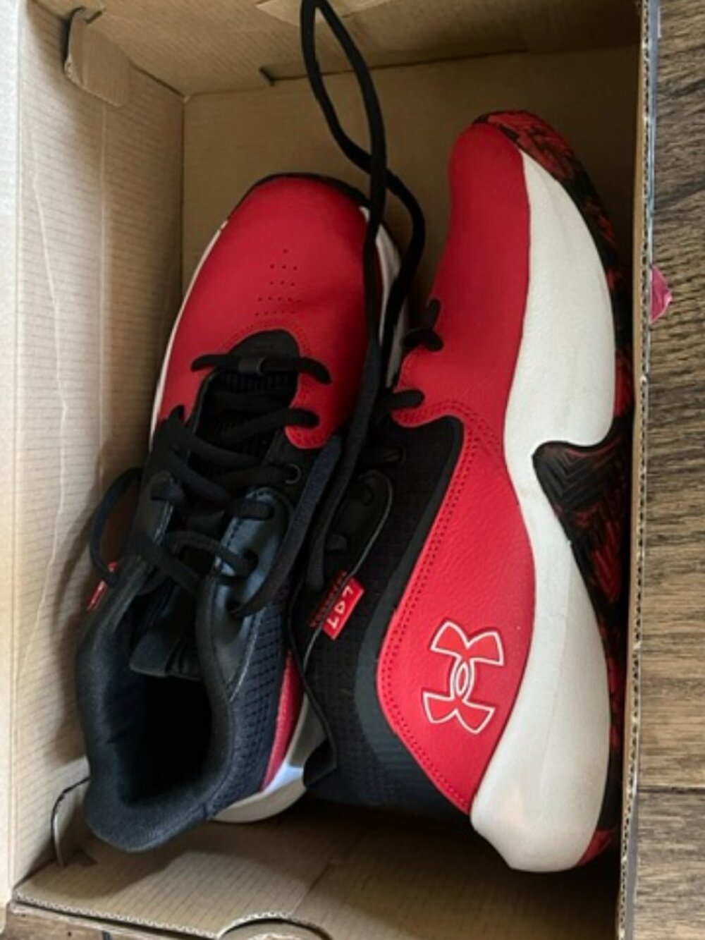 Youth Under Armour basketball shoes, 6Y